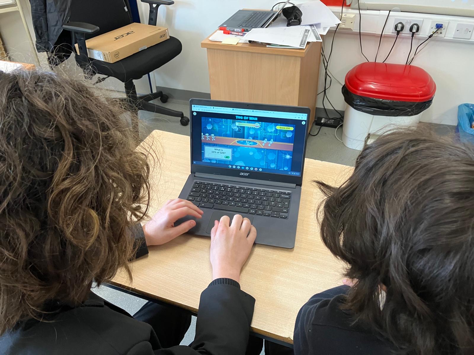 Students working together on a maths activity